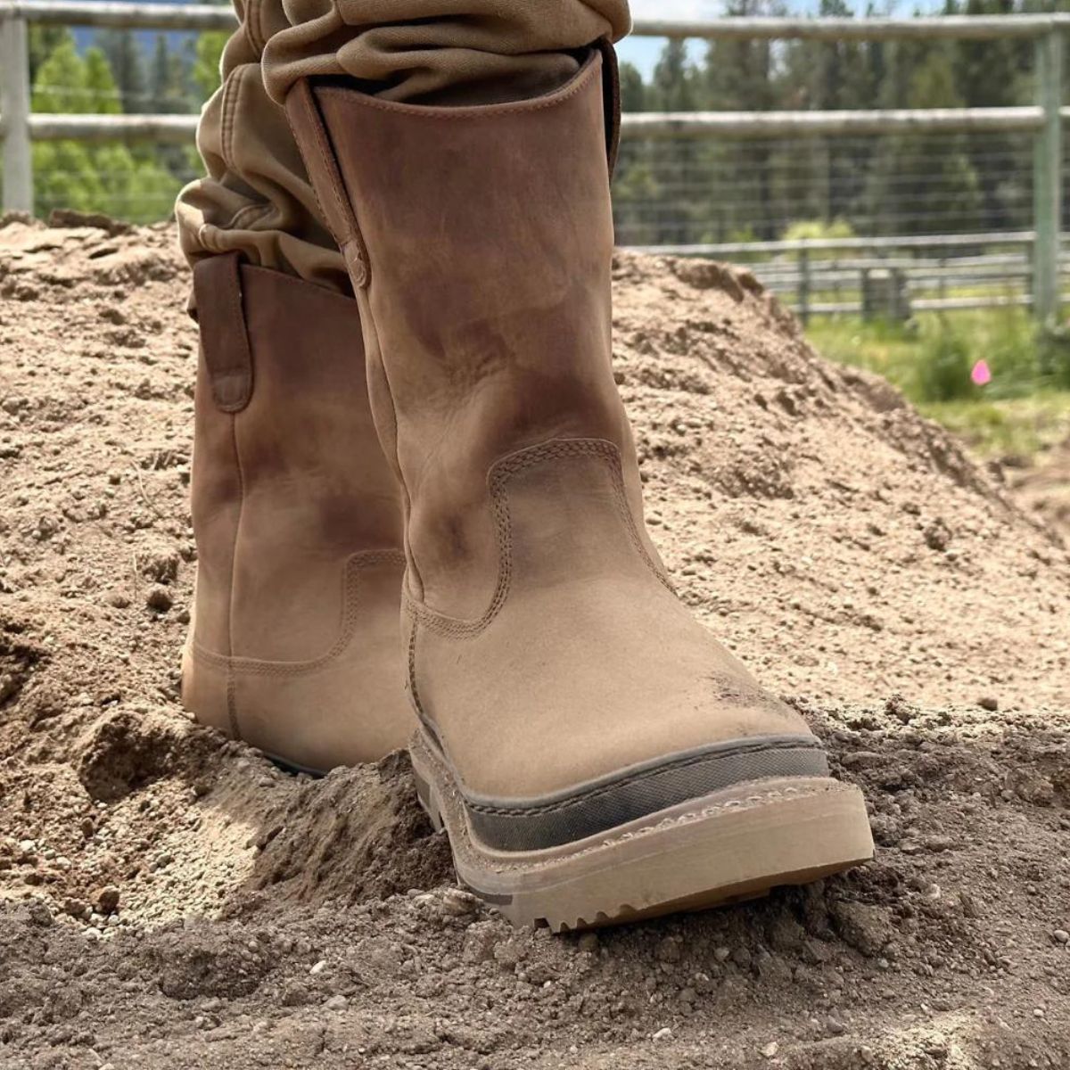 Rancher 11” Soft Toe Men’s Waterproof Work Boot in Brown, constructed with durable leather, reinforced stitching, and a tough outsole for superior grip, ideal for handling any challenging work conditions.